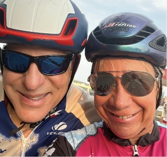 Two People with Bicycle Helmets On